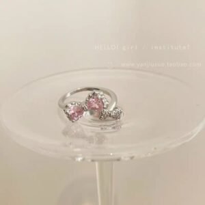 Anillo doble moño de cristal rosado