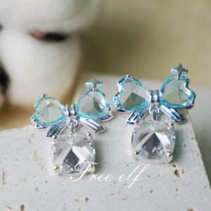 Aretes de moño cristal azul con colgante en plata modelo 15
