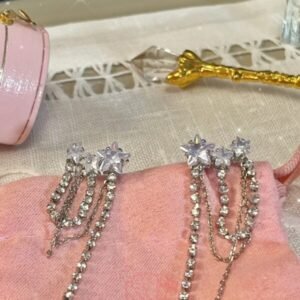 Arete estrellas de cristal con cadena brillante  en plata modelo 17