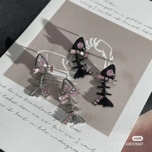 Aretes esqueleto de pez con piedra rosada