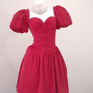 Vestido con botones de tela manga bombacha